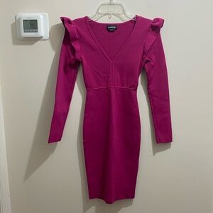 Bebe Women’s size XXS Stretch dress.  Long sleeve with Ruffle Never worn No tags